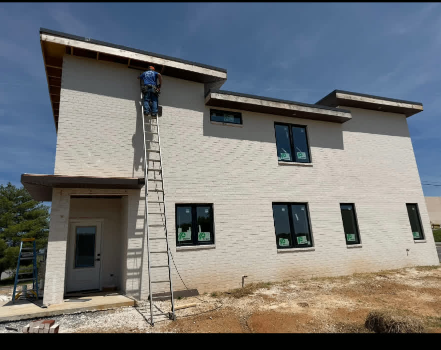Before — Low-slope roof and fascia install